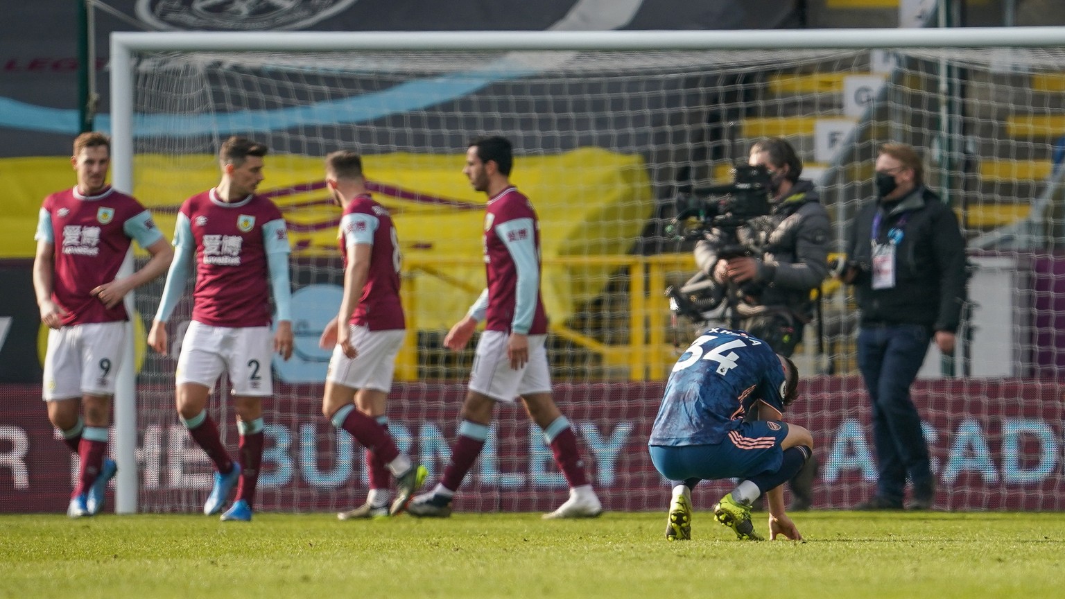 epa09056650 Granit Xhaka (C) of Arsenal reacts after the English Premier League soccer match between Burnley FC and Arsenal FC in Burnley, Britain, 06 March 2021. EPA/Jon Super / POOL EDITORIAL USE ON ...