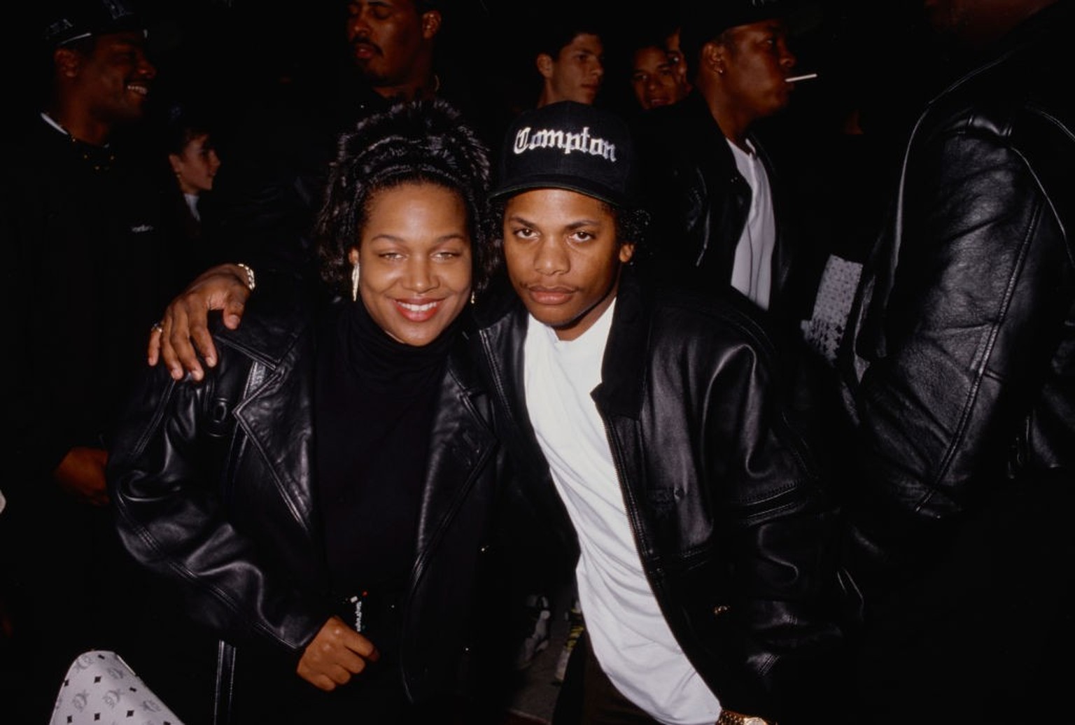 American R&amp;B singer Michel&#039;le (Michel&#039;le Denise Toussant), wearing a black leather jacket, with American rapper Eazy-E (1964-1995), wearing a black leather jacket and a Compton baseball  ...