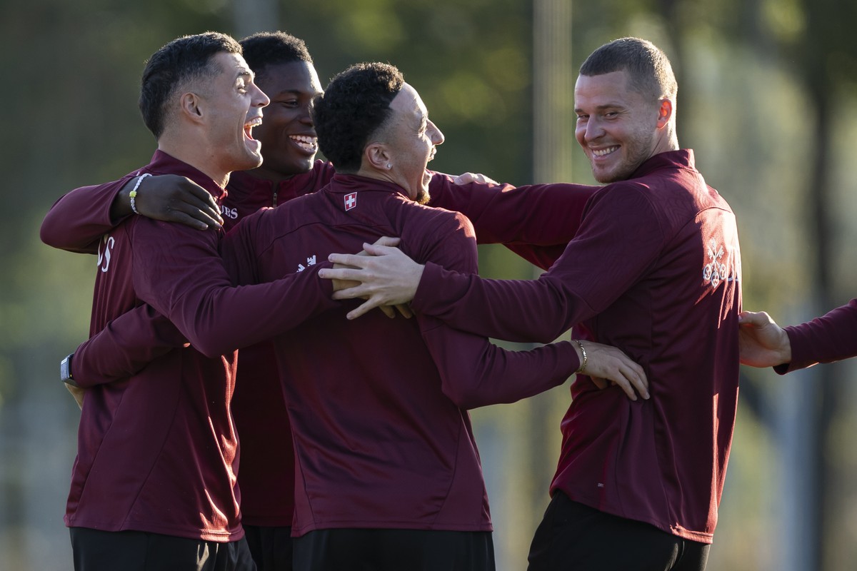 KEYPIX - Switzerland's players Granit Xhaka, Breel Embolo, Ruben Vargas, and Nico Elvedi, from left, react during a training session one day prior to the FIFA World Cup 26 UEFA Qualifiers Group B ...