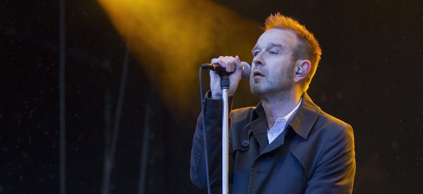 Kuno Lauener, singer of Swiss band Zueri West performs on the main stage at the Gurten music open air festival in Bern, Switzerland, Friday, July 13, 2012. (KEYSTONE/Peter Klaunzer)