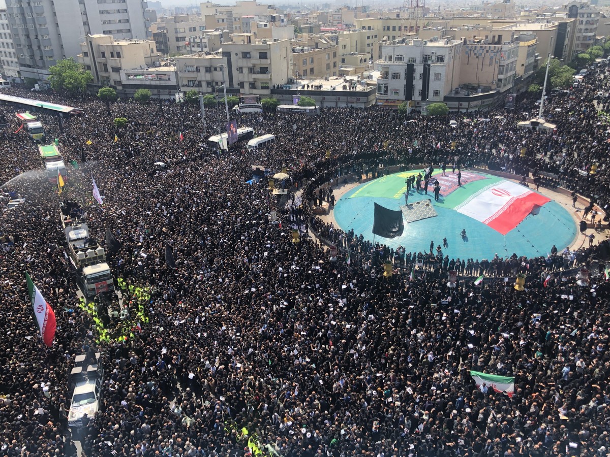epa11359603 Iranians take part in a funeral ceremony for late president Ebrahim Raisi in Tehran, Iran, 22 May 2024. Iranian president Raisi and seven others, among them foreign minister Amir-Abdollahi ...