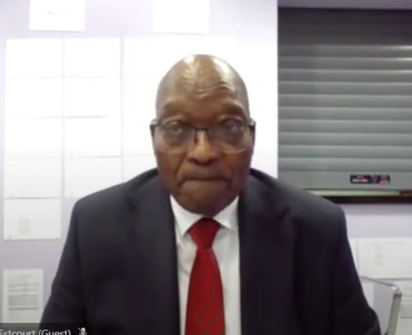 In this Frame grab former South Africa President Jacob Zuma, appears on a screen virtually from the correctional service facility Estcourt, in Pietermaritzburg, South Africa, Monday July 19, 2021, whe ...