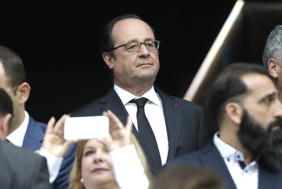 French President Francois Hollande arrives in the stands prior to the Euro 2016 Group A soccer match between France and Albania at the Velodrome stadium in Marseille, France, Wednesday, June 15, 2016. ...