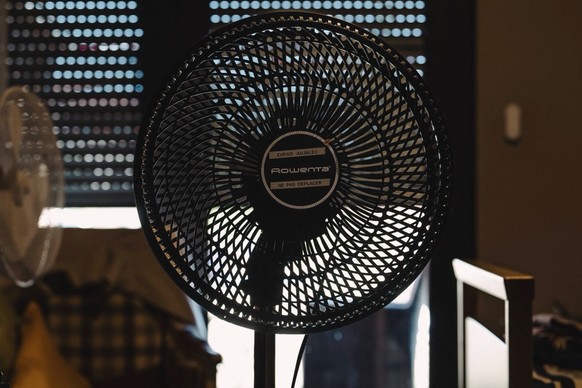 Visit to A Nursing Home in Occitanie - Negrepelisse A bedroom with the shutters closed and a pedestal fan. Period of Decompensation in Nursing Homes Following a Heat Wave. Visit to the Eugene Aujaleu  ...