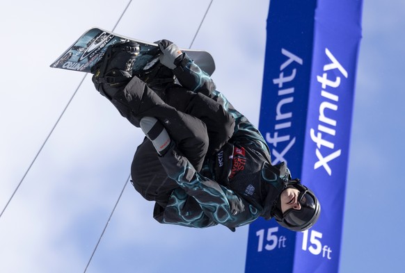 Jan Scherrer, of Switzerland, executes a trick in the halfpipe finals during the World Cup U.S. Grand Prix snowboarding event in Copper Mountain, Colo., Friday, Dec. 16, 2022. (AP Photo/Hugh Carey)