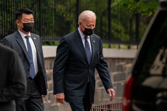 epa09436222 US President Joe Biden walks out of Holy Trinity Catholic Church after mass in the Georgetown neighborhood of Washington, DC, USA, 29 August 2021. President Biden earlier attended a dignif ...