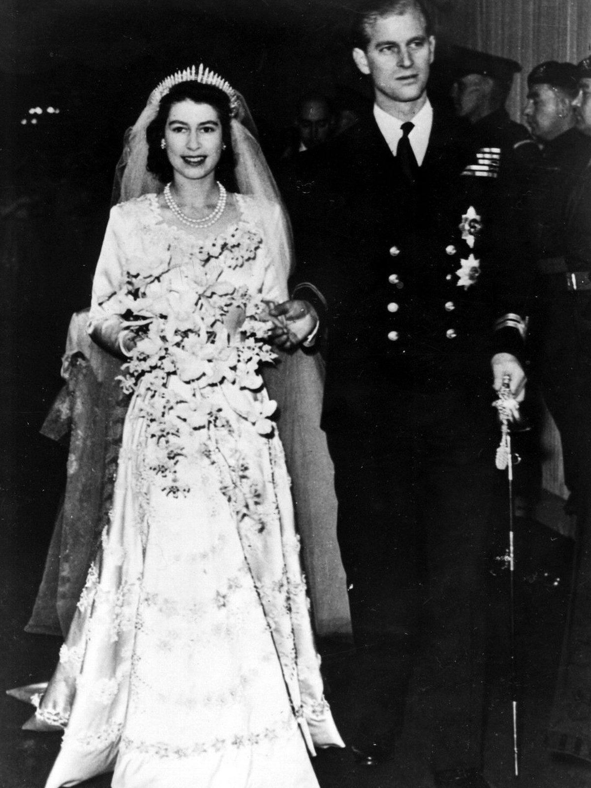 Britain's Princess Elizabeth leaves Westminster Abbey in London, with her husband, the Duke of Edinburgh, after their wedding ceremony, in this Nov. 20, 1947 photo. Clarence House in London annou ...