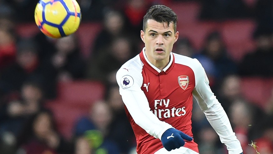 epa06394121 Arsenal Granit Xhaka in action during the English Premier league game between Arsenal and Newcastle United at the Emirates stadium in London, Britain, 16 December 2017. EPA/FACUNDO ARRIZAB ...