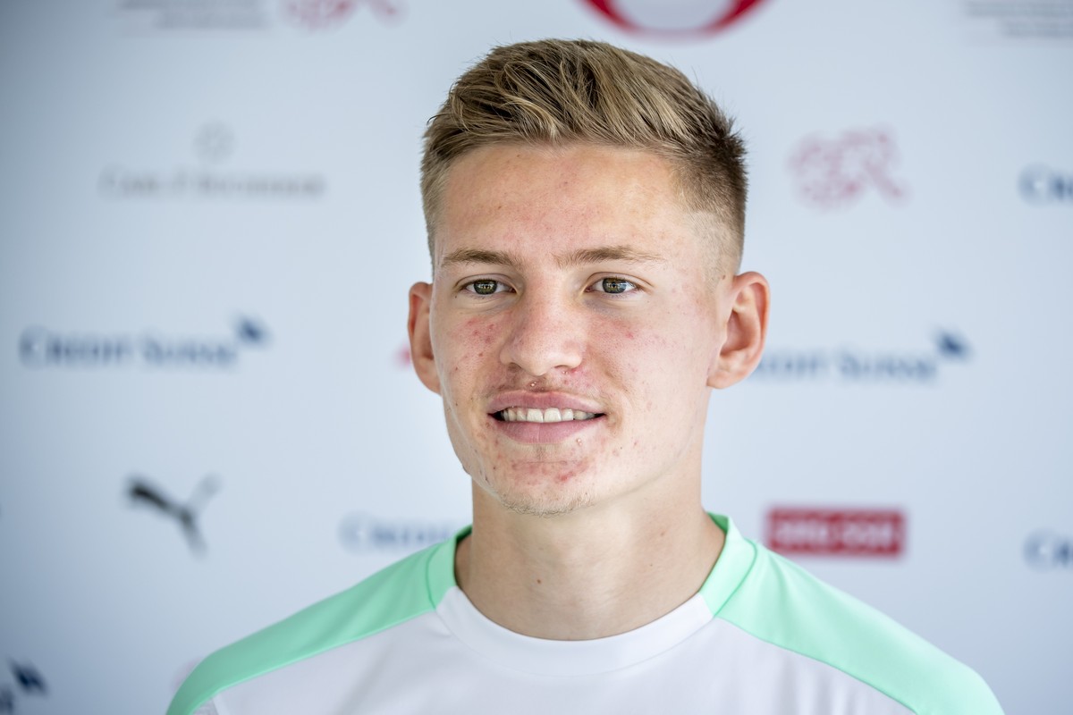 Switzerland's defender Becir Omeragic, speaks to journalists after a training session prior to the UEFA EURO 2020 soccer tournament at the Dalga Arena, in Baku, Azerbaijan, Thursday, June 10, 202 ...