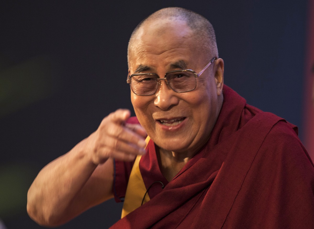 Tibetan spiritual leader the Dalai Lama gestures as he delivers a talk in New Delhi, India, Saturday, Nov. 22, 2014. The Dalai Lama spoke on "Cultivating Key Human Values." (AP Photo/Tsering ...