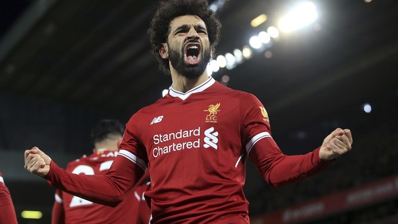 Liverpool&#039;s Mohamed Salah celebrates scoring his side&#039;s second goal against Leicester City during the English Premier League soccer match at Anfield, Liverpool, England, Saturday Dec. 30, 20 ...