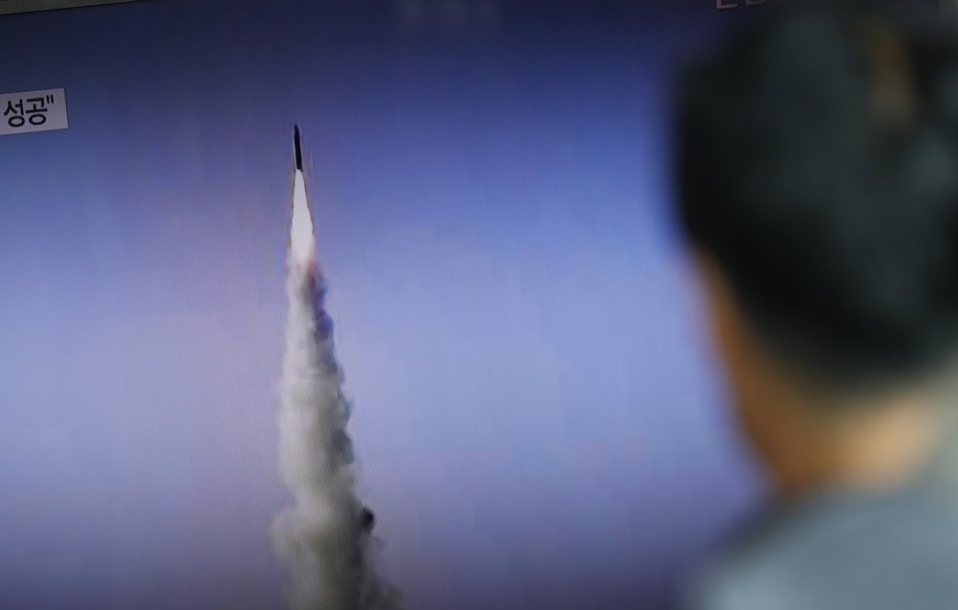 epa06064464 (FILE) - A South Korean man watches a television displaying news broadcasts reporting on North Korea&#039;s recent medium-range ballistic missile launch at a station in Seoul, South Korea, ...