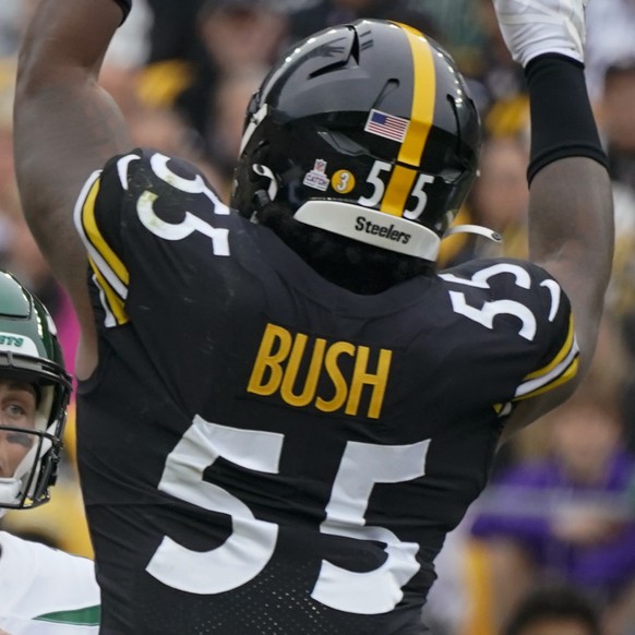 New York Jets quarterback Zach Wilson (2) passes as Pittsburgh Steelers linebacker Devin Bush (55) pressures him during the first half of an NFL football game, Sunday, Oct. 2, 2022, in Pittsburgh. (AP ...