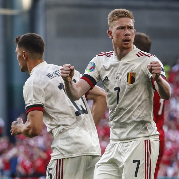 Belgium&#039;s Kevin De Bruyne reacts after Thorgan Hazard scored during the Euro 2020 soccer championship group B match between Denmark and Belgium, at the Parken stadium in Copenhagen, Thursday, Jun ...