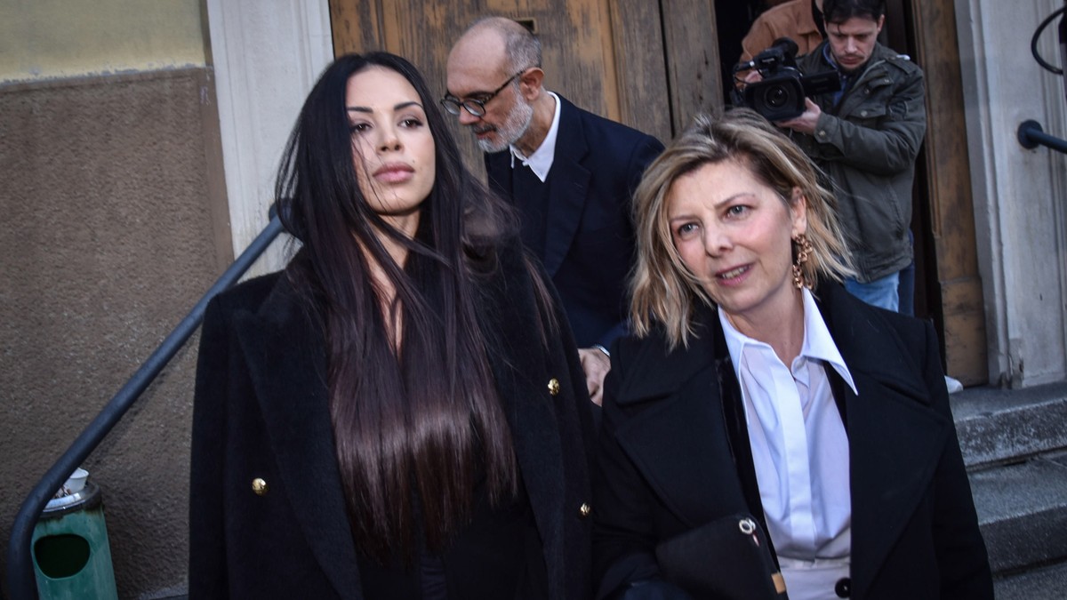epa10468040 Karima El Mahroug (L), also known as Ruby, leaves the court Ruby following her acquittal in the Ruby III trial in Milan, Italy, 15 February 2023. El Mahroug, who became known as 'Ruby ...