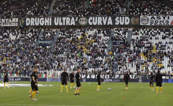 Young Boys players warm up prior to the Champions League, group H soccer match between Juventus and Young Boys, at the Allianz stadium in Turin, Italy, Tuesday, Oct. 2, 2018. (AP Photo/Luca Bruno)