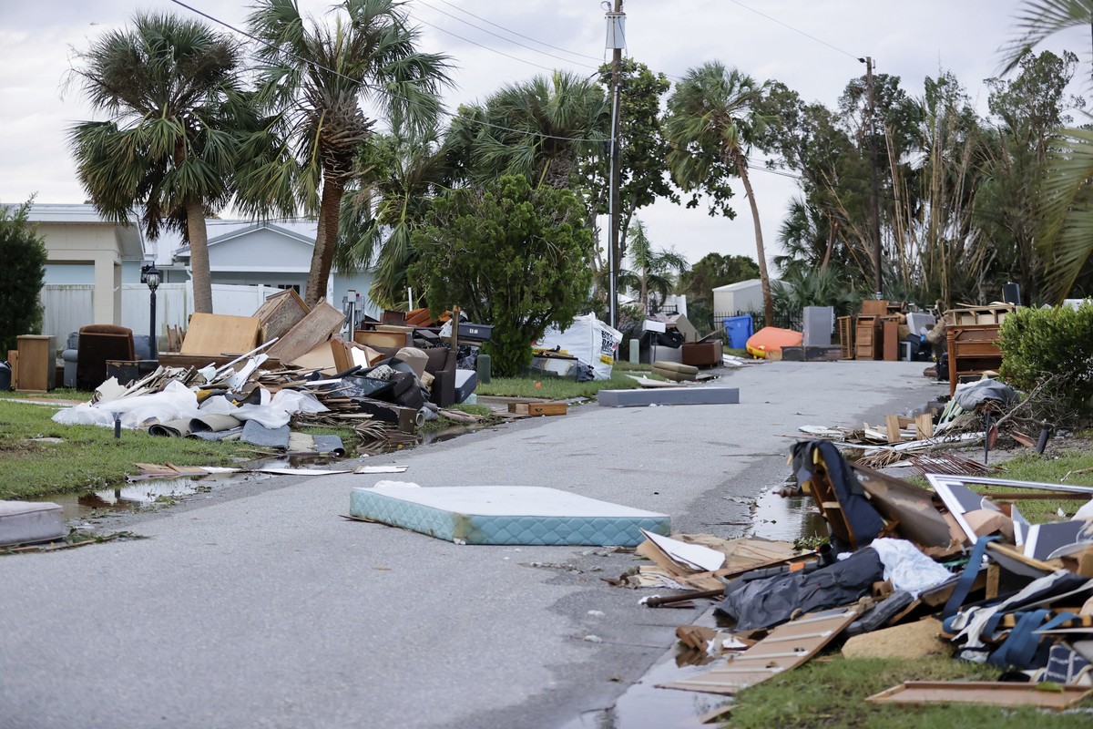 Debris left over from Hurricane Helene is pictured on the side of a road near Bahia Beach, in the aftermath of Hurricane Milton, on Thursday, Oct. 10, 2024 in Ruskin, Fla. (Luis Santana/Tampa Bay Time ...