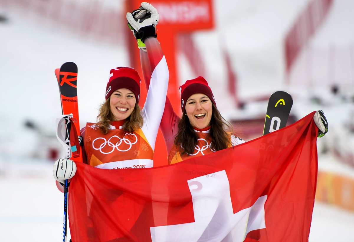 epa06552616 Gold medal winner Michelle Gisin (L) of Switzerland and Bronze medal winner Wendy Holdener (R) of Switzerland celebrate during the venue ceremony for the Women's Alpine Combined race  ...