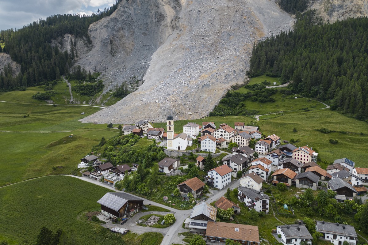 A general view shows the village Brienz-Brinzauls below the rockfall "Brienzer Rutsch" on Friday, June 16, 2023, in Brienz-Brinzauls, Graubuenden, Switzerland. On Friday night, a large part  ...