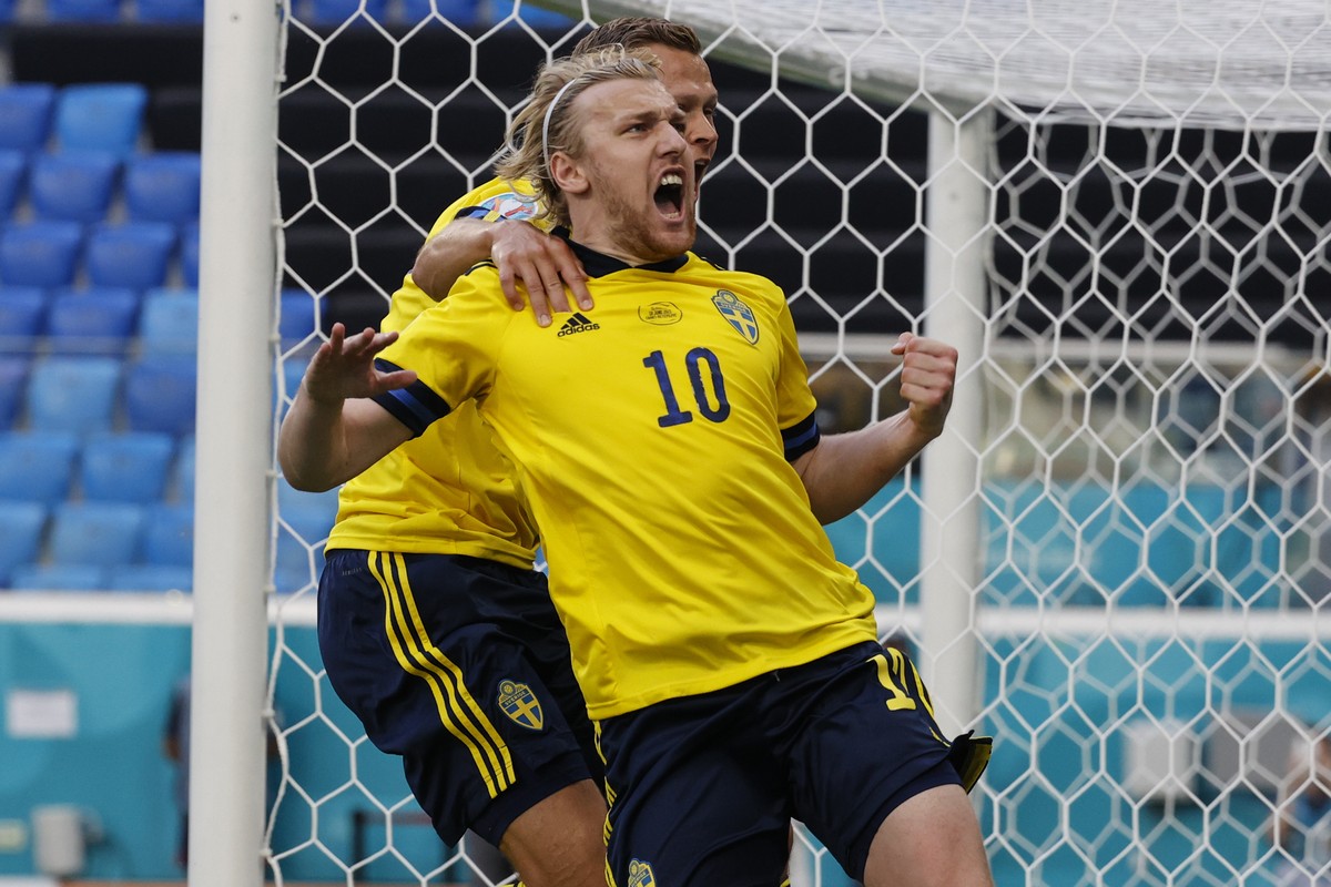 Sweden's Emil Forsberg celebrates after scoring his side's opening goal during the Euro 2020 soccer championship group E match between Sweden and Slovakia, at the Saint Petersburg stadium, i ...