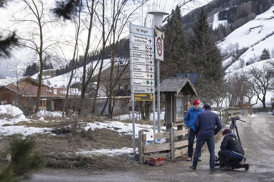 Media gather near at place where a car had plowed into a group of people in Luttach, near Bruneck in the northern region South Tirol, Italy, Sunday, Germany, Jan. 5, 2020. Italian fire officials say a ...