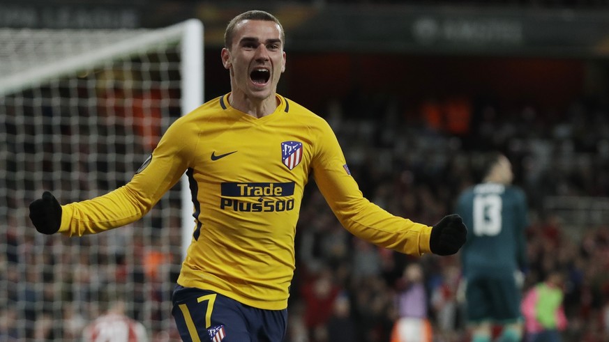 FILE - In this Thursday, April 26, 2018 file photo, Atletico&#039;s Antoine Griezmann celebrates after scoring the first goal of his team during the Europa League semifinal first leg soccer match betw ...