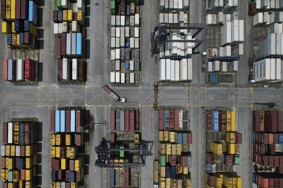 A truck navigates along stacks of containers at the Manila North Harbour Port in Manila, Philippines on Thursday, Aug. 7, 2025. (AP Photo/Aaron Favila)
Philippines Trump Tariffs Asia