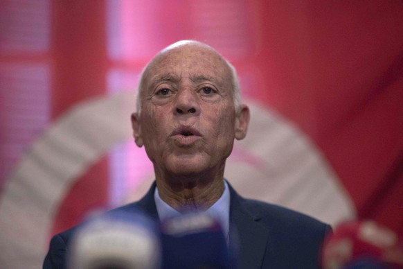 Tunisian independent law professor Kais Saied speaks to his supporters and the media after advancing to the second round in the country&#039;s presidential elections, in his office in Tunis, Tunisia,  ...