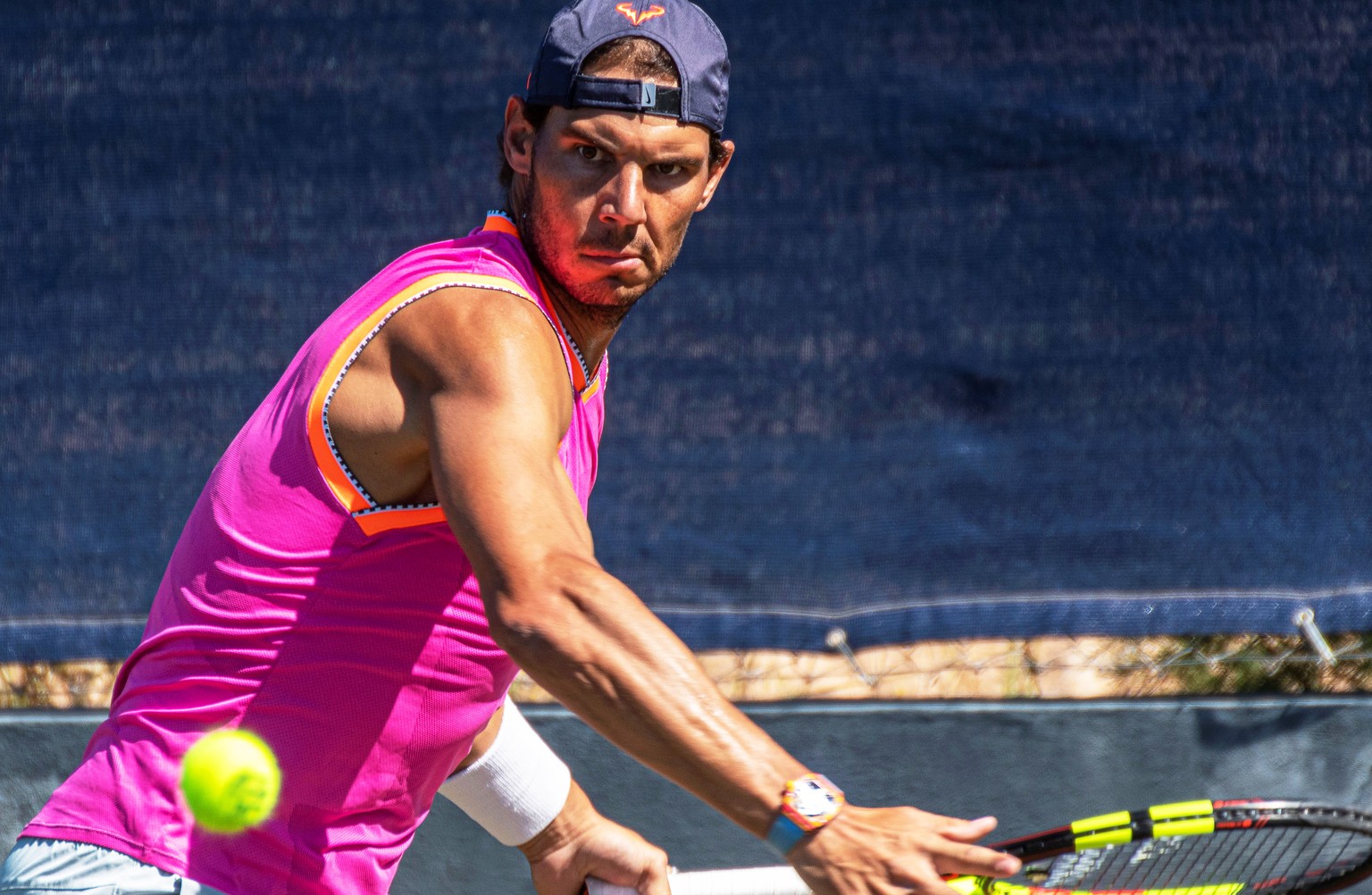 epa07655673 Spanish tennis player Rafael Nadal attends a training session at the Country Club in Santa Posa, Mallorca, Spain, 18 June 2019. Nadal prepares for the upcoming Wimbledon Championships. EPA ...