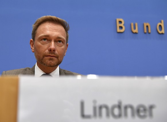 Christian Lindner, the leader and top candidate of the German Free Democratic Party, FDP, attends the federal press conference in Berlin, Germany, Monday, Sept. 25, 2017, one day after the German parl ...