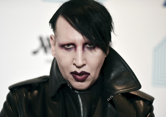 FILE - Marilyn Manson attends the 9th annual &quot;Home for the Holidays&quot; benefit concert in Los Angeles, on Dec. 10, 2019. Authorities searched the home of the rocker on Monday, Nov. 29, 2021, a ...