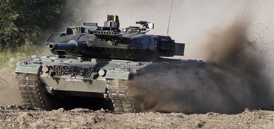 A Leopard 2 tank is pictured during a demonstration event held for the media by the German Bundeswehr in Munster near Hannover, Germany, Wednesday, Sept. 28, 2011. Germany will continue to ?weigh ever ...