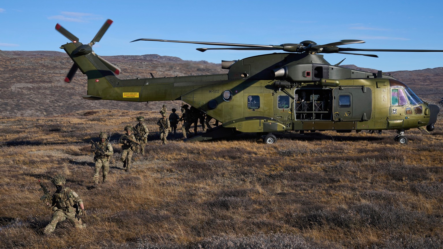 Danish military forces participate in an exercise with hundreds of troops from several European NATO members in Kangerlussuaq, Greenland, Wednesday, Sept. 17, 2025. (AP Photo/Ebrahim Noroozi)
Greenlan ...