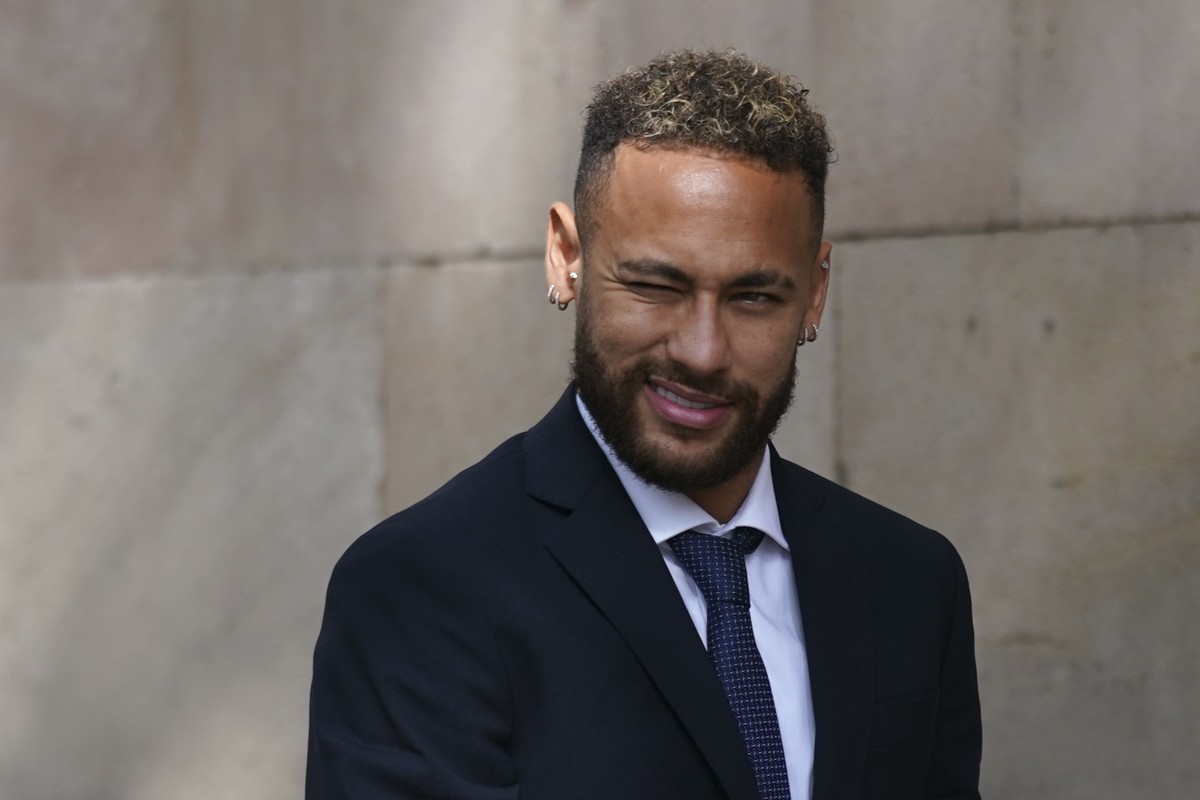 Former FC Barcelona player Neymar who now plays for Paris Saint-Germain winks as he leaves a court on the second day of a trial in Barcelona, Spain, Tuesday Oct. 18, 2022. Neymar appeared in court to  ...