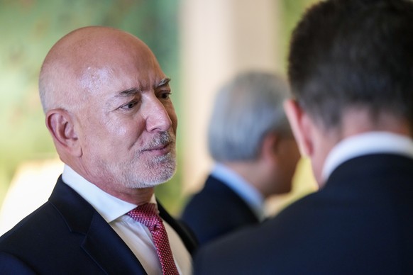 Amazon founder Jeff Bezos attends a meeting at Blair House between Britain's King Charles III and chief executives from the technology industry, Tuesday, April 28, 2026, in Washington. (Ken Ceden ...
