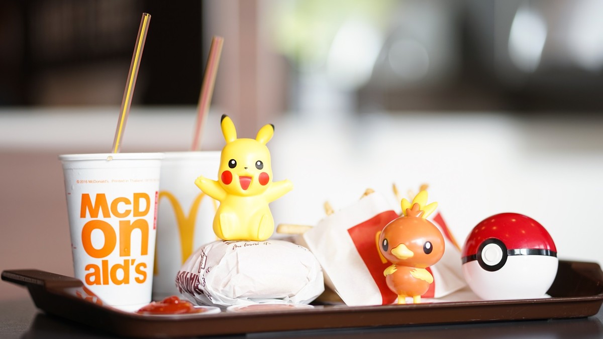 Happy Meal set at McDonald`s and Pokemon plastic toys, Bangkok, Thailand - Nov 17, 2018 : A photo of Happy Meal set at McDonald`s with Pokemon plastic toys launch to promote Pokemon let`s go Pikachu a ...