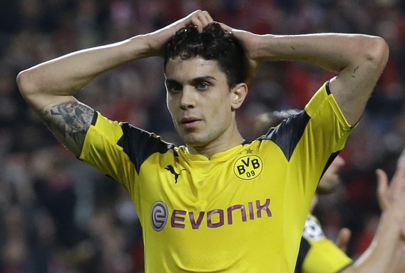 FILE - In this file photo dated Tuesday, Feb. 14, 2017, Dortmund&#039;s Marc Bartra reacts during the Champions League round of 16, first leg, soccer match between Benfica and Borussia Dortmund at the ...