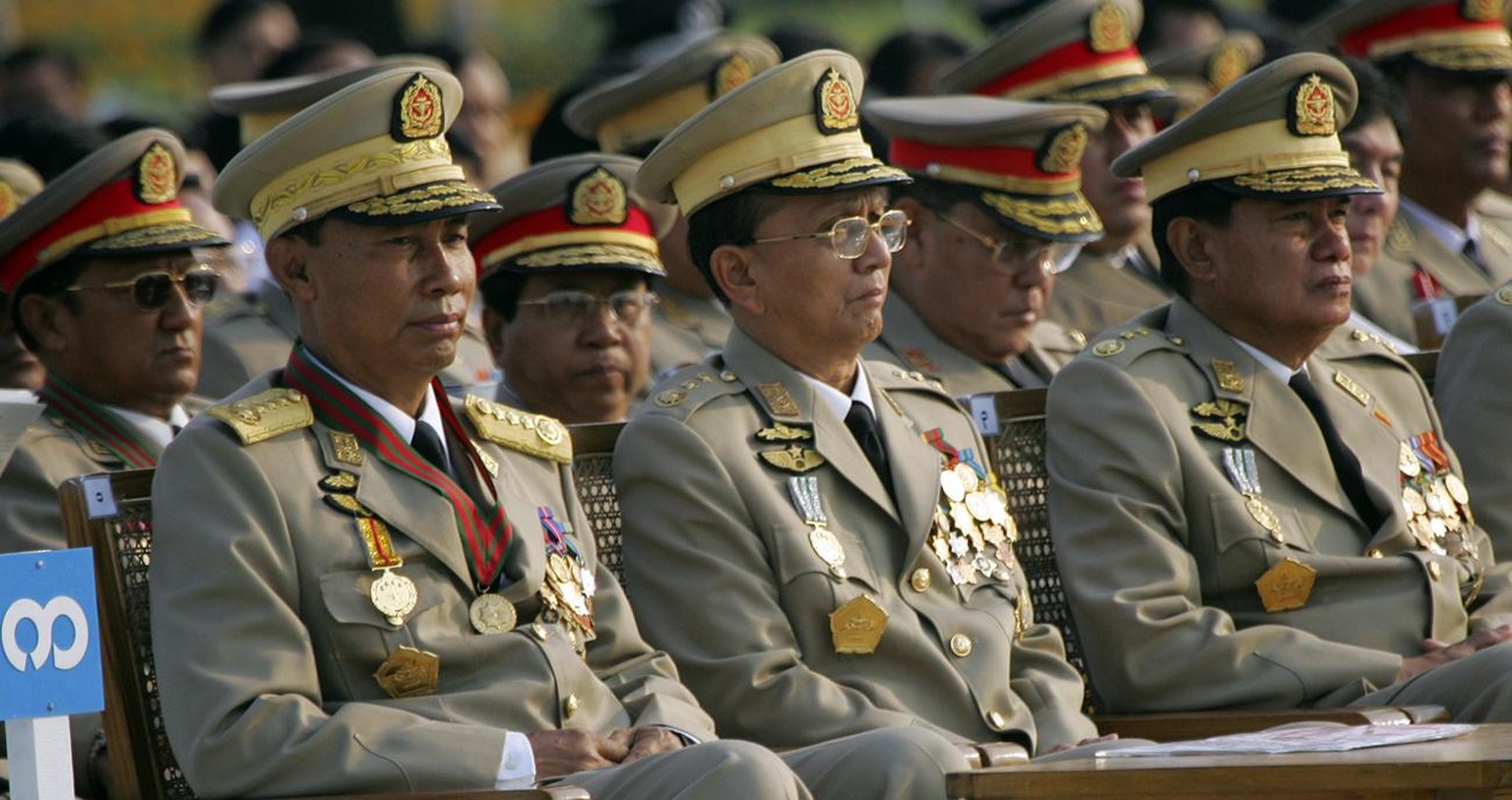 Myanmar junta leaders Gen. Thura Shwe, left, Lt. Gen. Thein Sein, center and Lt. Gen Kyaw Win, right, look on during 62nd annual Armed Forces Day ceremonies Tuesday, March 27, 2007, in the capital cit ...