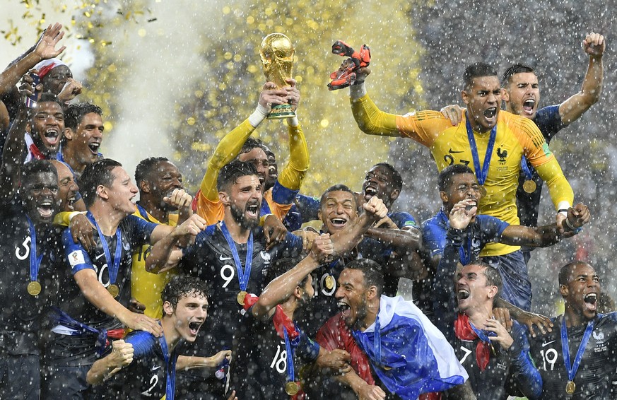 FILE - France goalkeeper Hugo Lloris lifts the trophy after France won 4-2 during the final match between France and Croatia at the 2018 soccer World Cup in the Luzhniki Stadium in Moscow, Russia, Sun ...