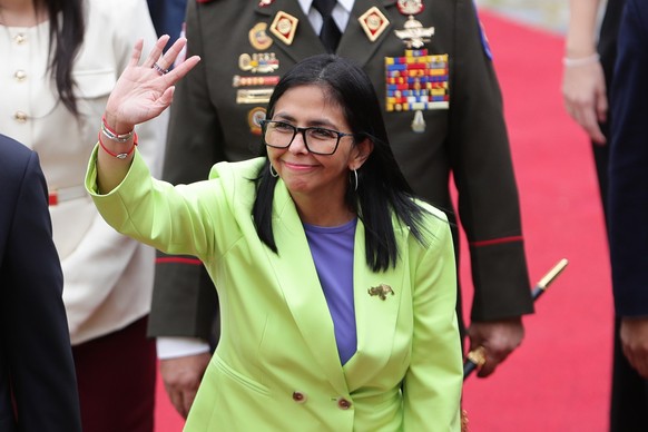 epa12652216 The acting president of Venezuela, Delcy Rodriguez, waves before presenting a report to Parliament in Caracas, Venezuela, 15 January 2026. Rodriguez delivered the report as Venezuelan Pres ...