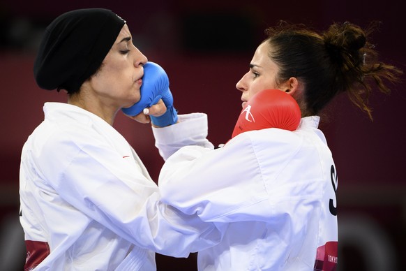 Elena Quirici, right, of Switzerland competes in the women&#039;s karate kumite +61kg fight against Feryal Abdelaziz of Egypt at the 2020 Tokyo Summer Olympics in Tokyo, Japan, on Saturday, August 07, ...