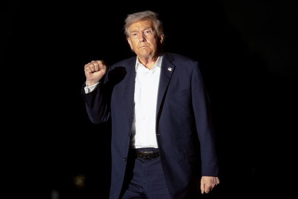 epa12452415 US President Donald Trump on the South Lawn of the White House after arriving on Marine One in Washington, DC, USA, 14 October 2025. Trump returned after a one-day tour of Israel and Egypt ...