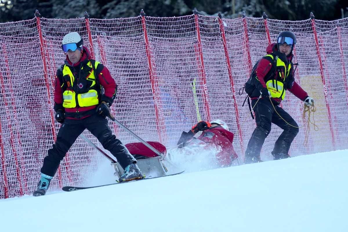 Slovakia's Petra Vlhova is carried down with a toboggan after falling during the first run of an alpine ski, women's World Cup giant slalom race, in Jasna, Slovakia, Saturday, Jan. 20, 2024. ...