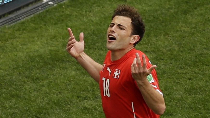 Switzerland&#039;s Admir Mehmedi celebrates scoring his side&#039;s first goal during the group E World Cup soccer match between Switzerland and Ecuador at the Estadio Nacional in Brasilia, Brazil, Su ...