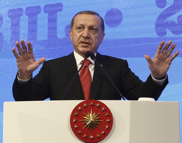 Turkey&#039;s President Recep Tayyip Erdogan addresses a NATO parliamentary assembly meeting in Istanbul, Monday, Nov. 21, 2016. Erdogan has called on the United States and other nations to re-assess  ...