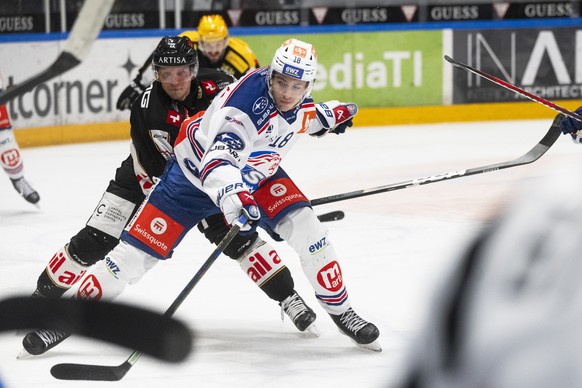 From left Santieri Alatalo (HCL), Nicolas Baechler (ZSCL), during the regular season of National League A (NLA) Swiss Championship 2024/25 between HC Lugano and ZSC Lions at the ice stadium Corner Are ...