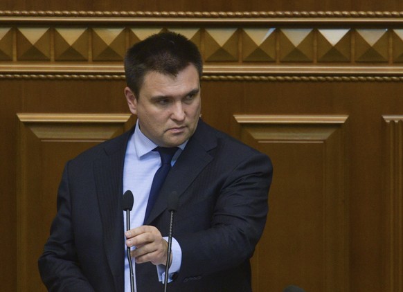epa07191853 Ukrainian Foreign Minister Pavlo Klimkin speaks to lawmakers during extraordinary session of Parliament in Kiev, Ukraine, 26 November 2018. Ukrainian Parliament voted for accepting of the  ...