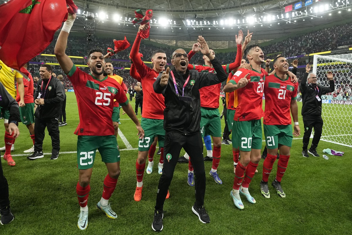 Morocco's players celebrate after the World Cup quarterfinal soccer match between Morocco and Portugal, at Al Thumama Stadium in Doha, Qatar, Saturday, Dec. 10, 2022. (AP Photo/Martin Meissner)