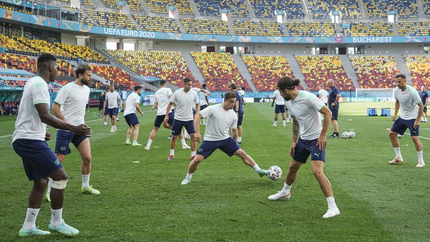 Switzerland&#039;s Xherdan Shaqiri kicks the ball during a training session at the National Arena stadium in Bucharest, Romania, Sunday, June 27, 2021, the day before their round of 16 match against F ...