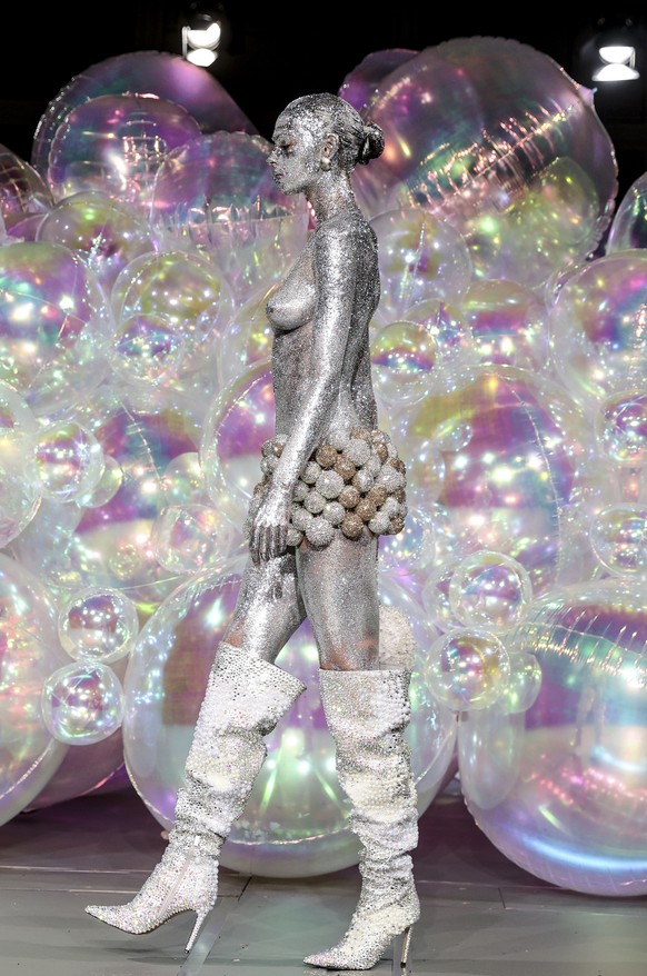 epa12229897 A model presents a creation from the Haute Couture Autumn/Winter 2025/2026 collection by Swiss designer Kevin Germanier for his label Germanier during Paris Fashion Week, in Paris, France, ...